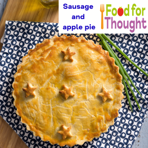 sausage and apple pie served on a table