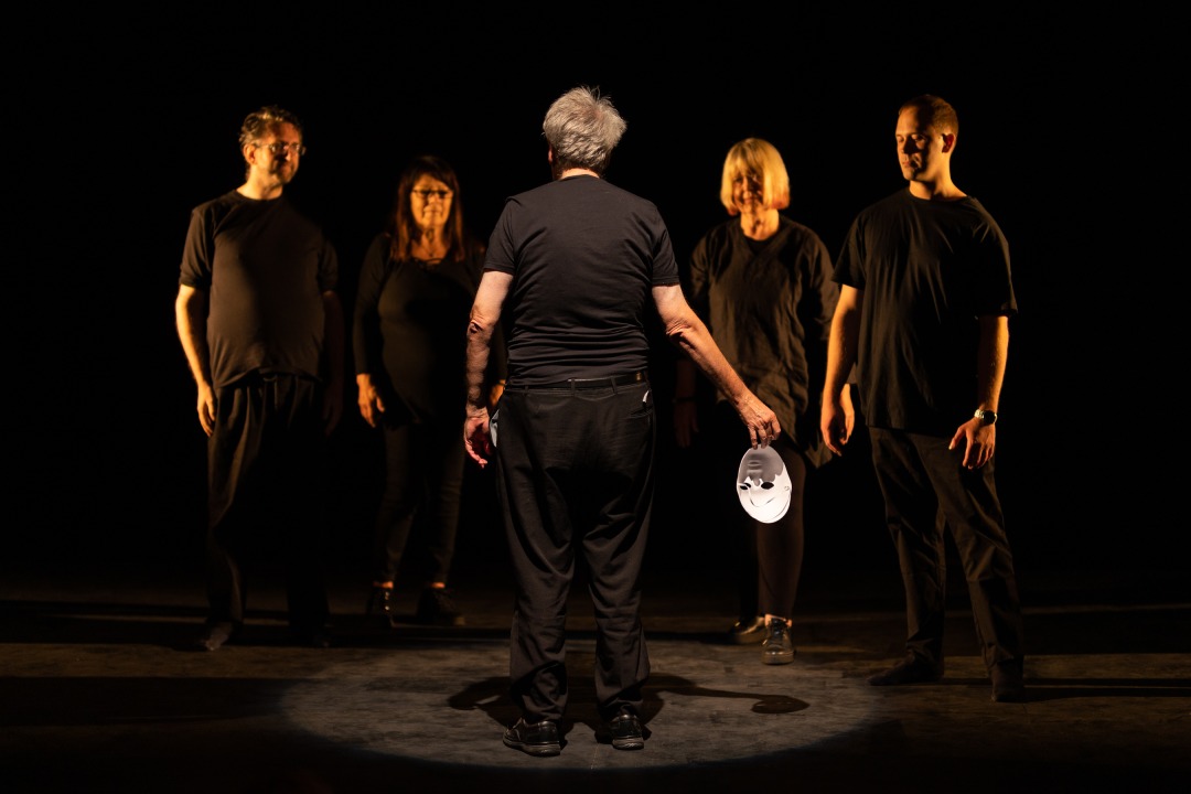 A group of people in a theatre during a drama group