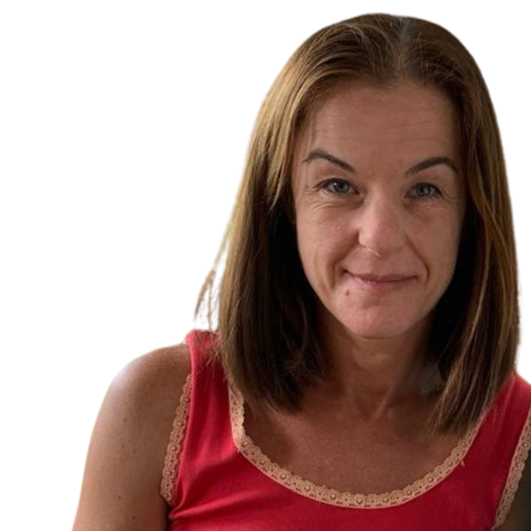 A woman with brown hair wearing an orange top.