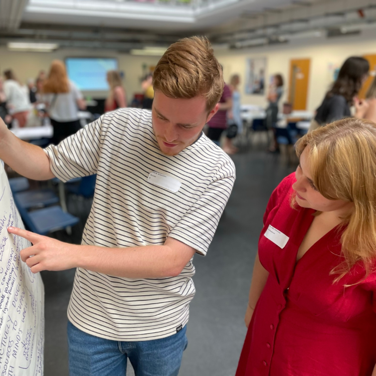 Members of Bath Mind's EDI network looking at a chart