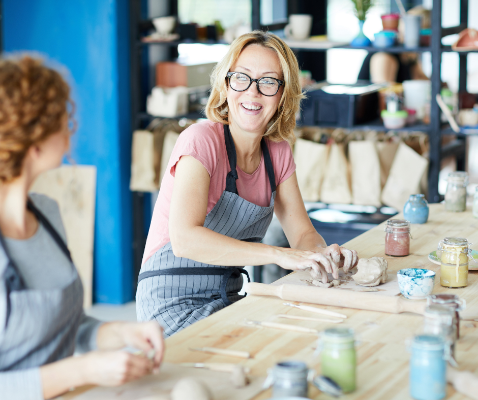 women crafting at pottery making