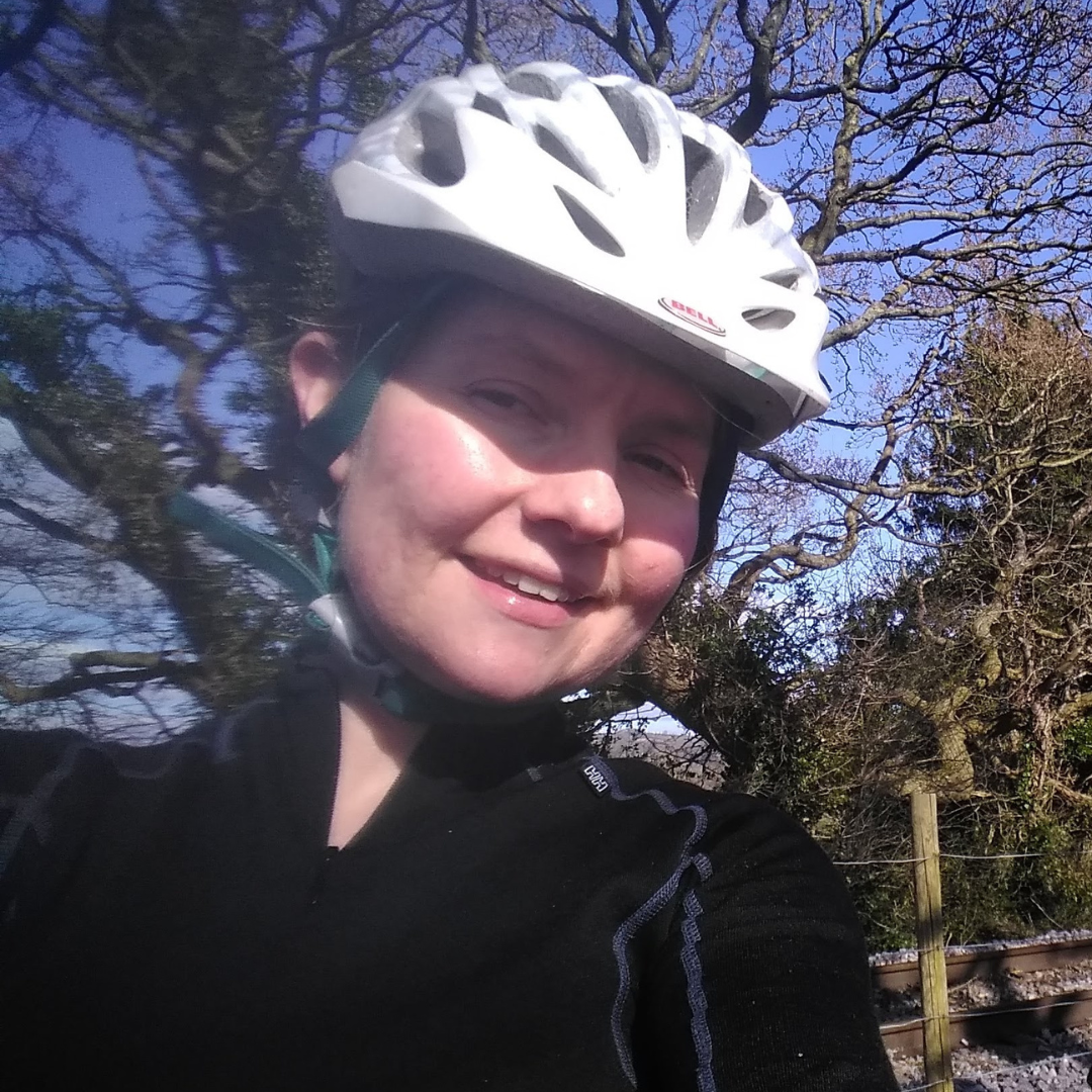 A woman on a cycle