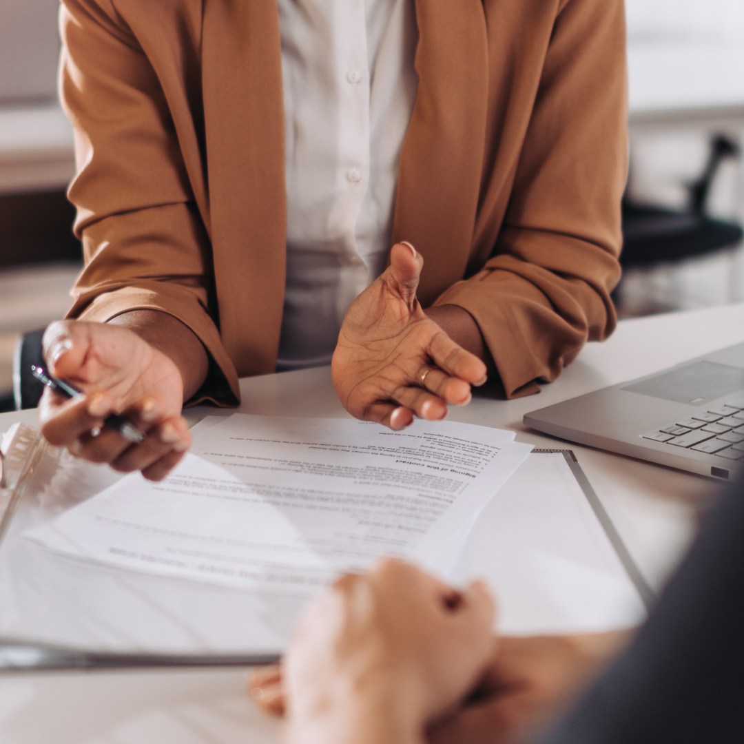 two people sat at a table during a consultation
