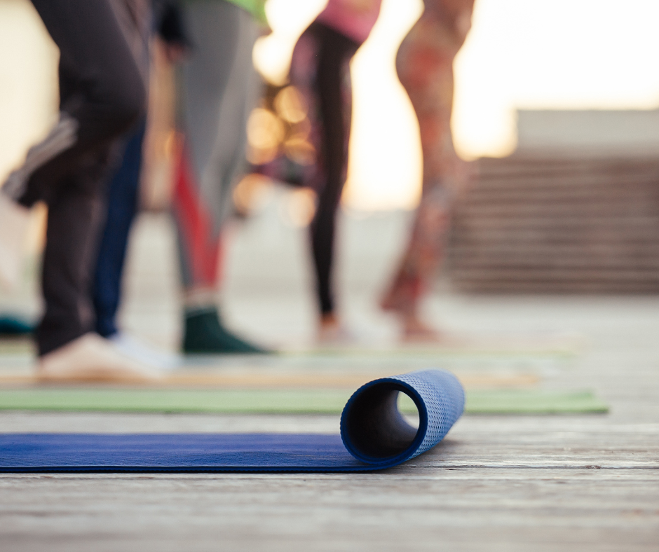 People doing yoga in a group